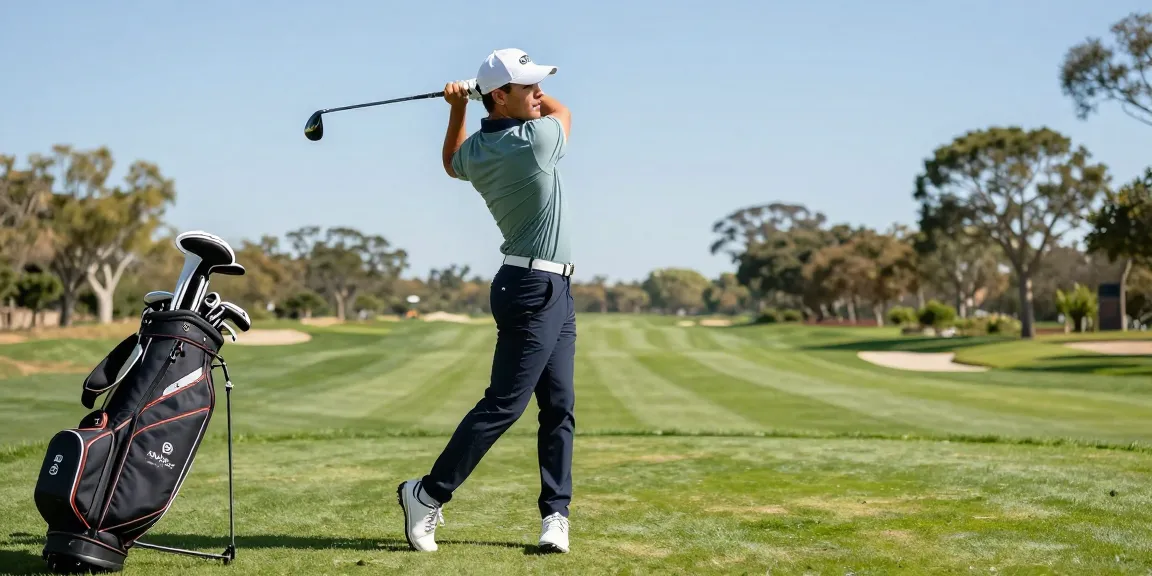 Golfer in stylish 골프웨어 레플리카 swinging on a lush golf course.